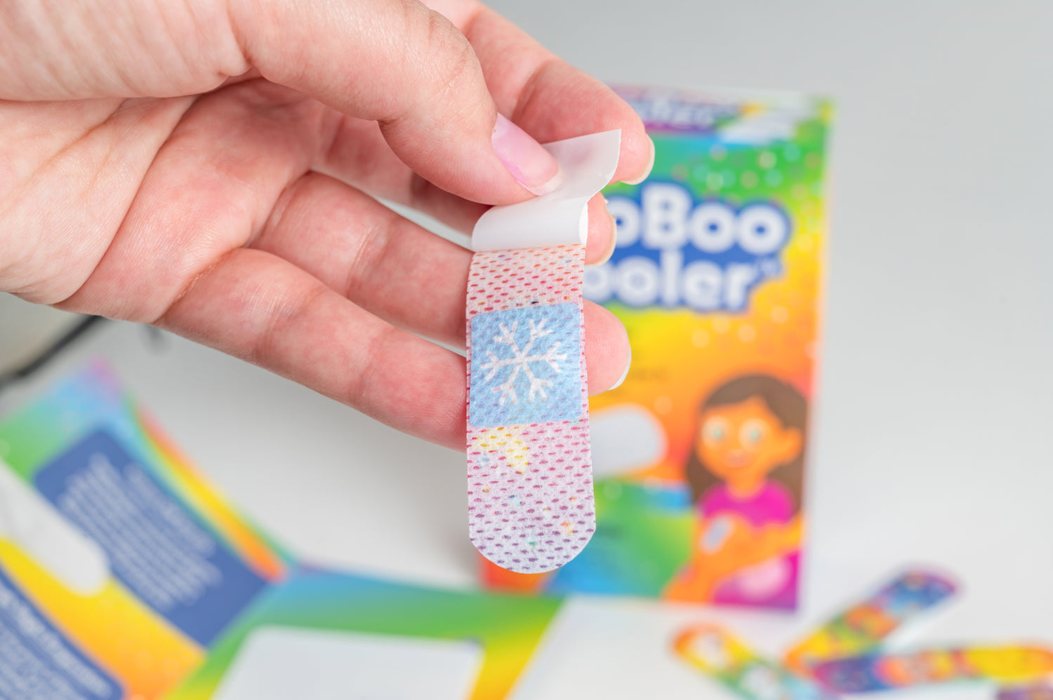 BooBoo Cooler alongside regular bandages, showing incremental purchase — placeholder, assistant to replace