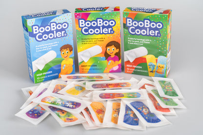 Three BooBoo Cooler boxes with wrapped kids cooling bandages spread out in front