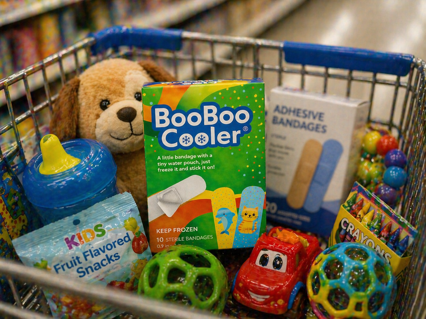 Parent applying BooBoo Cooler to a child — the moment it earns loyalty